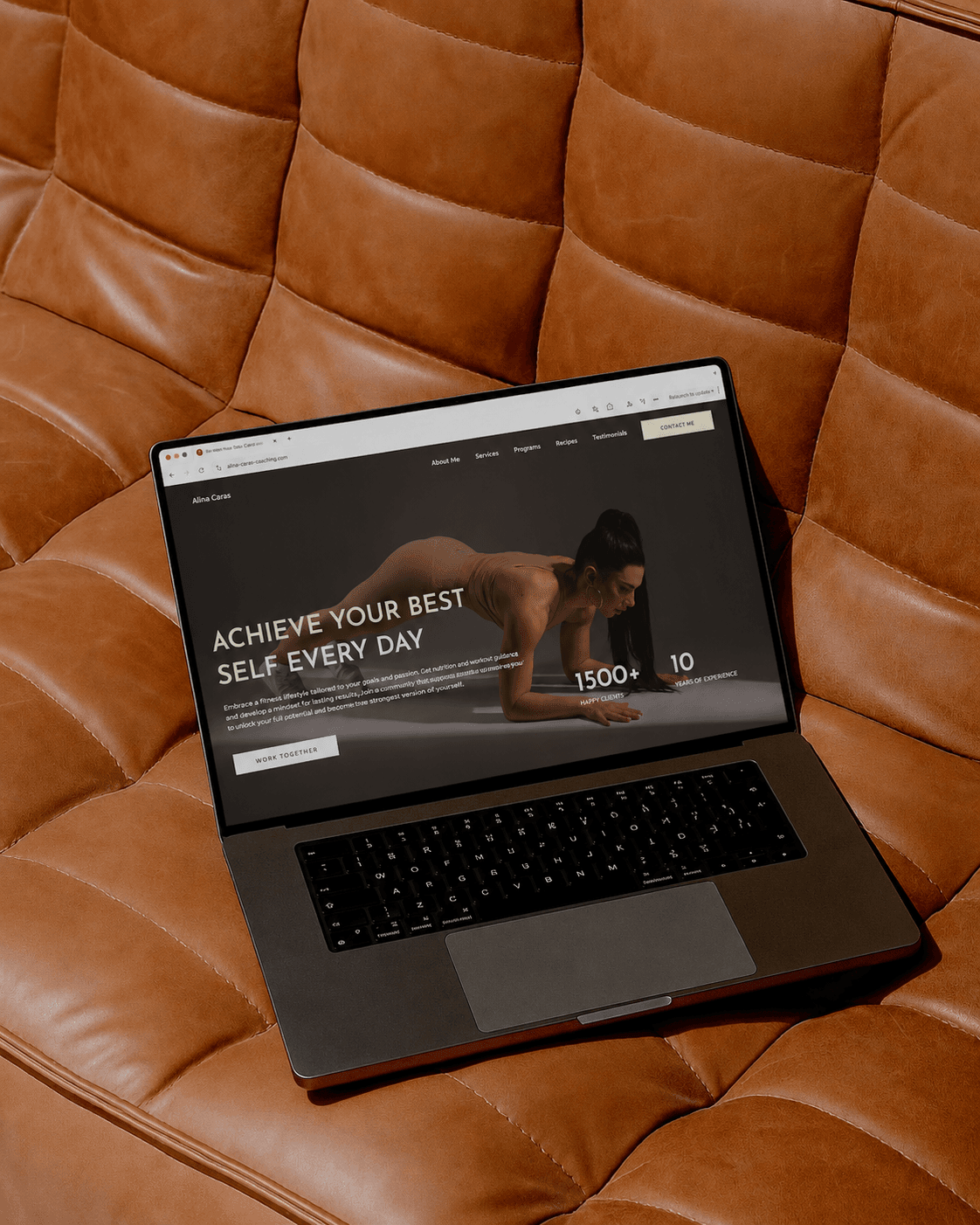 Laptop showing Coach Alina fitness website — programs, booking, and brand storytelling by Image Logix